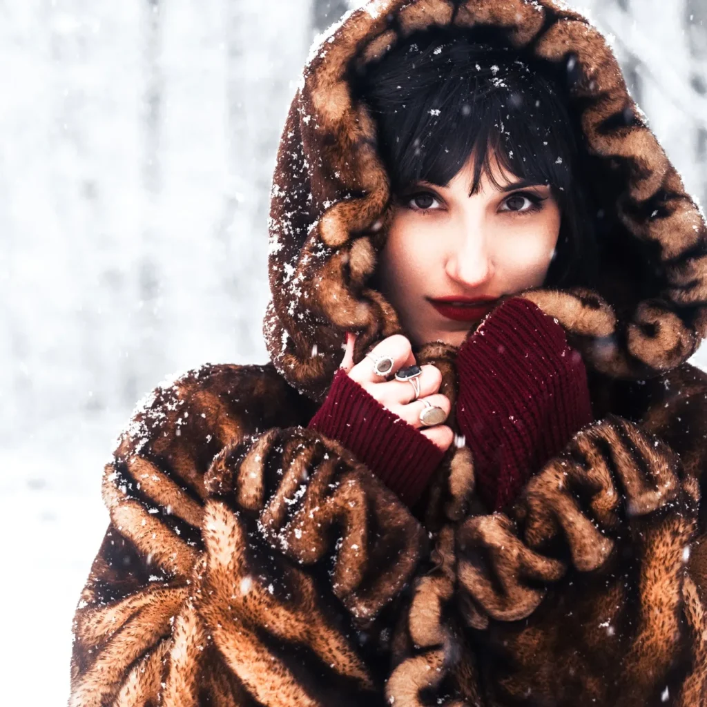female fashion portrait in the snow at Harrisburg train tracks